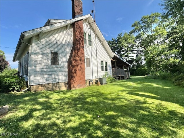 825 Summit St, Salem, OH 44460 - view of side of property featuring a chimney and a yard