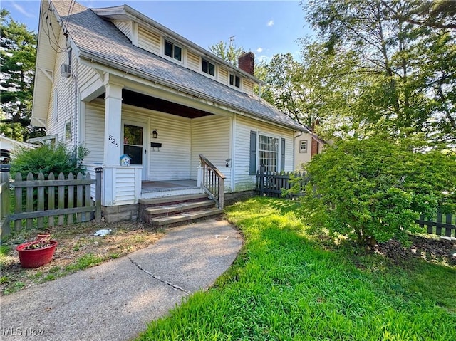 825 Summit St, Salem, OH 44460 - bungalow-style house with covered porch, a chimney, and roof with shingles