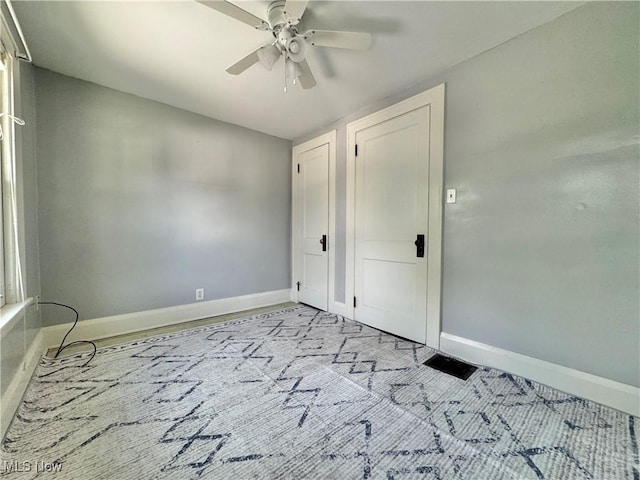 825 Summit St, Salem, OH 44460 - unfurnished bedroom with a ceiling fan and carpet flooring