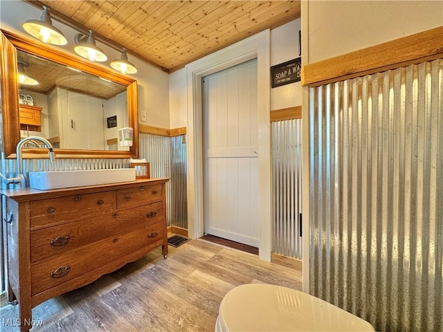 825 Summit St, Salem, OH 44460 - bathroom with wood finished floors, a wainscoted wall, vanity, and wooden ceiling