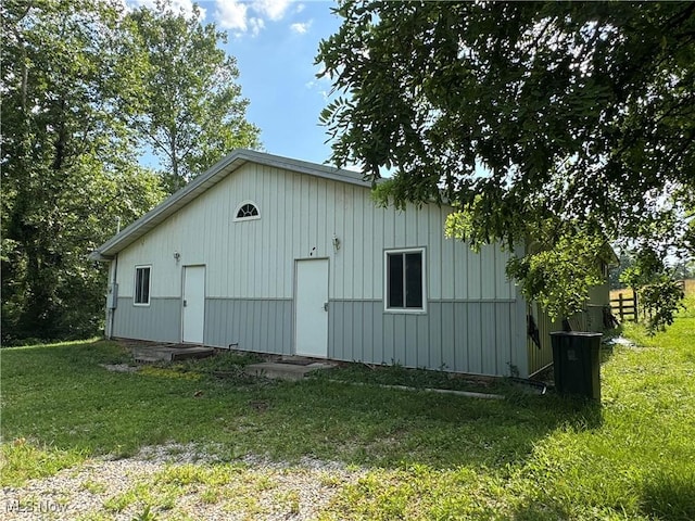 67 Neil Ann Dr, Parkersburg, WV 26101 - view of property exterior featuring a yard and board and batten siding