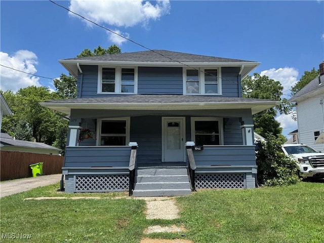 329 E Broad St, Newton Falls, OH 44444 - traditional style home with a porch and roof with shingles