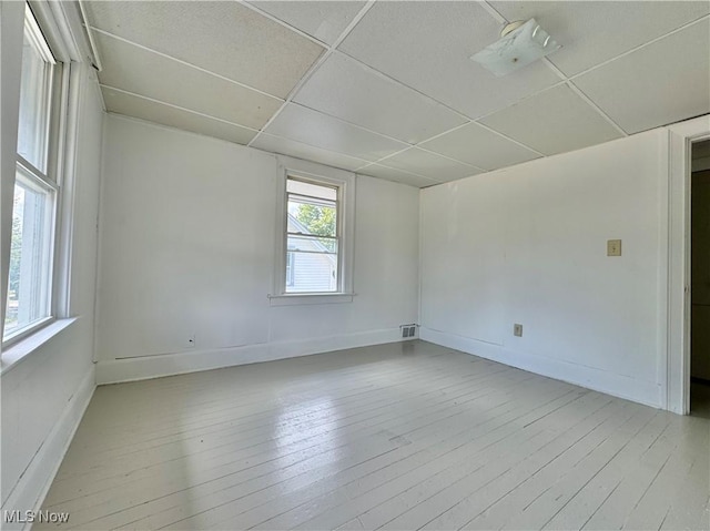 329 E Broad St, Newton Falls, OH 44444 - unfurnished room featuring a paneled ceiling and wood-type flooring