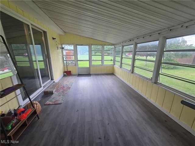 221 S Elm St, Jefferson, OH 44047 - unfurnished sunroom featuring lofted ceiling, wood finished floors, and wooden walls