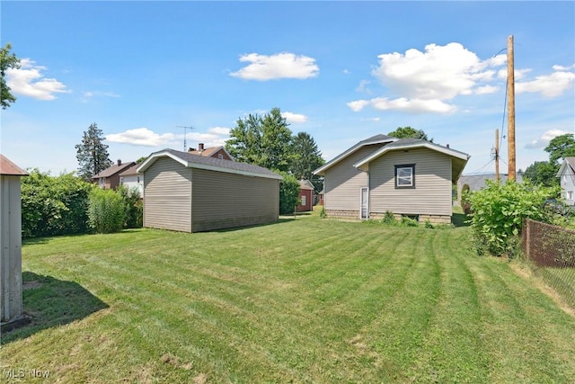 2602 Fletcher Ave NE, Canton, OH 44705 - view of green lawn with a storage unit