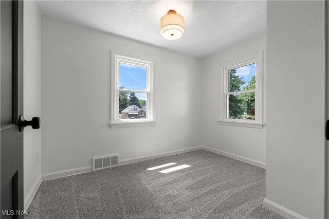 1146 Raff Rd SW, Canton, OH 44710 - carpeted spare room with plenty of natural light