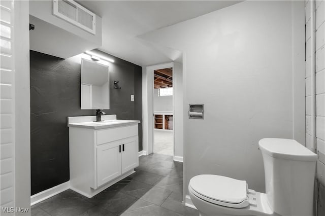 1146 Raff Rd SW, Canton, OH 44710 - bathroom featuring vanity and tile patterned flooring