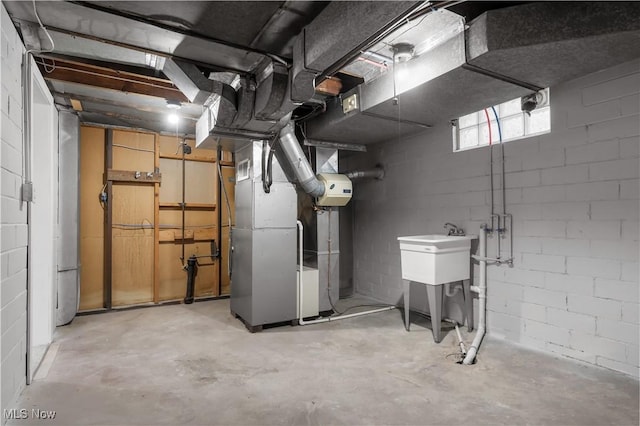 1146 Raff Rd SW, Canton, OH 44710 - below grade area featuring heating unit