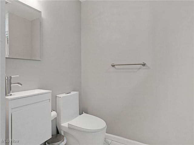 5265 Bellview St, Maple Heights, OH 44137 - half bathroom with vanity and marble look tile flooring