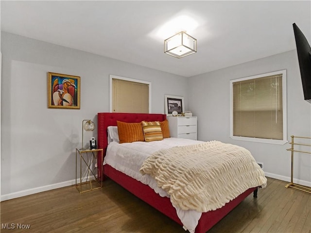 5265 Bellview St, Maple Heights, OH 44137 - bedroom featuring baseboards and wood finished floors