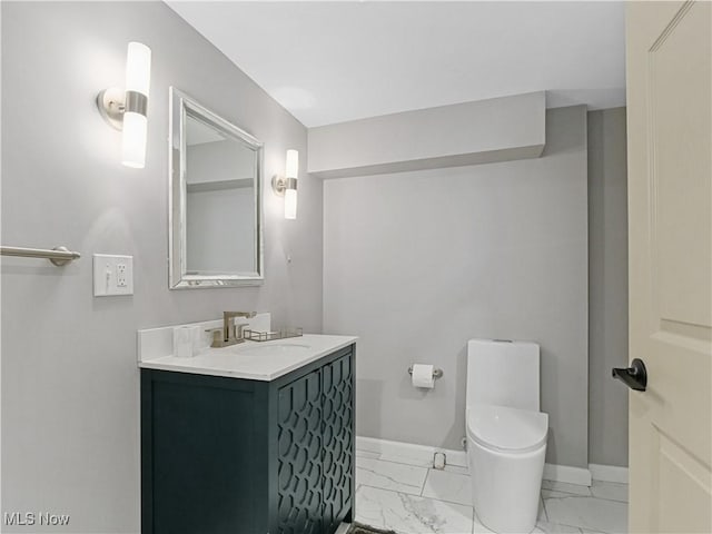 5265 Bellview St, Maple Heights, OH 44137 - bathroom featuring marble look tile flooring and vanity