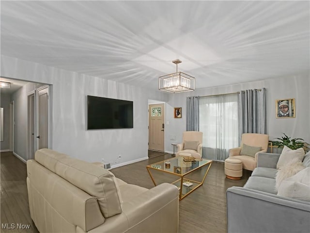 5265 Bellview St, Maple Heights, OH 44137 - living area with dark wood-style floors and a chandelier