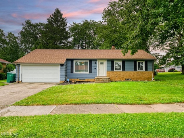5265 Bellview St, Maple Heights, OH 44137 - single story home featuring an attached garage, a chimney, concrete driveway, a front yard, and entry steps