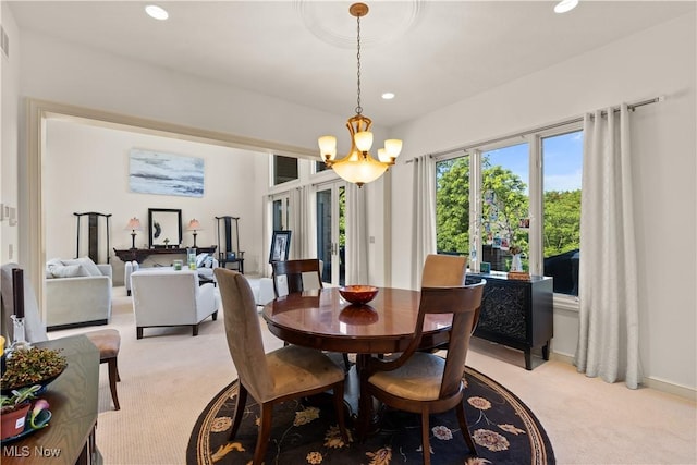 112 Caraplace, Wintersville, OH 43953 - dining area with light colored carpet, recessed lighting, and a chandelier