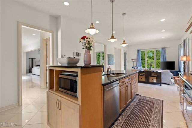 112 Caraplace, Wintersville, OH 43953 - kitchen featuring appliances with stainless steel finishes, open floor plan, dark countertops, recessed lighting, and light tile patterned floors