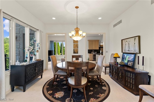 112 Caraplace, Wintersville, OH 43953 - dining area with light carpet, a chandelier, and recessed lighting
