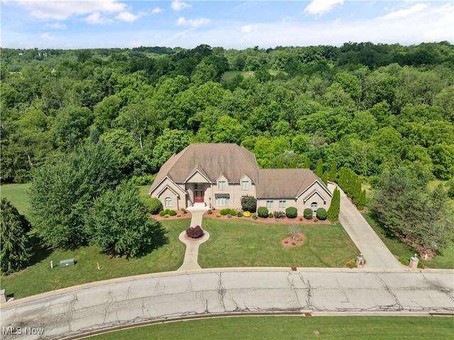 112 Caraplace, Wintersville, OH 43953 - aerial view of property and surrounding area with a heavily wooded area