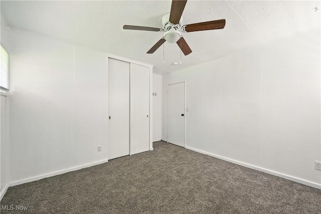 5149 Langfitt St, Vermilion, OH 44089 - unfurnished bedroom with carpet flooring, a closet, and a ceiling fan