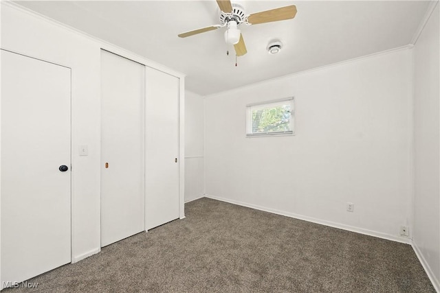 5149 Langfitt St, Vermilion, OH 44089 - unfurnished bedroom featuring carpet floors, a closet, ornamental molding, and a ceiling fan