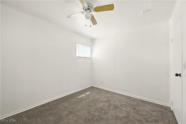 5149 Langfitt St, Vermilion, OH 44089 - spare room featuring dark colored carpet, ceiling fan, and crown molding