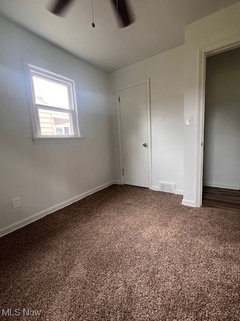 86 Fatima, Campbell, OH 44405 - unfurnished bedroom with carpet floors and ceiling fan