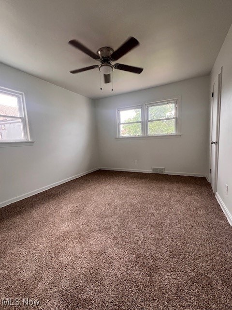 86 Fatima, Campbell, OH 44405 - carpeted empty room featuring ceiling fan and baseboards