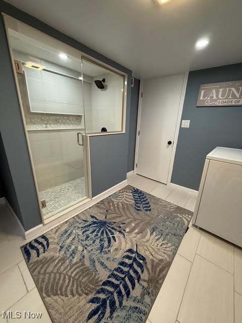 21430 Lakeshore Blvd, Euclid, OH 44123 - full bathroom with washer / dryer, a shower stall, tile patterned flooring, and recessed lighting