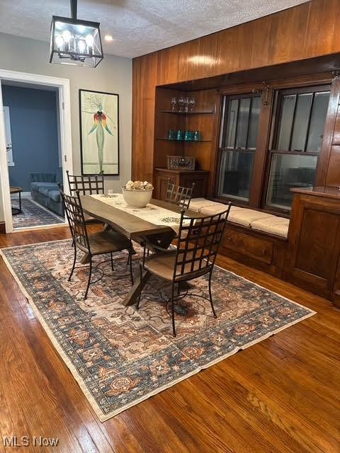 21430 Lakeshore Blvd, Euclid, OH 44123 - dining area with a textured ceiling and wood-type flooring