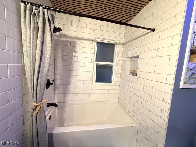 21430 Lakeshore Blvd, Euclid, OH 44123 - bathroom featuring shower / bathtub combination with curtain