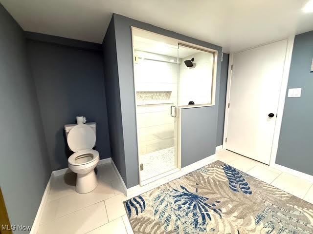 21430 Lakeshore Blvd, Euclid, OH 44123 - bathroom with a shower stall and tile patterned flooring
