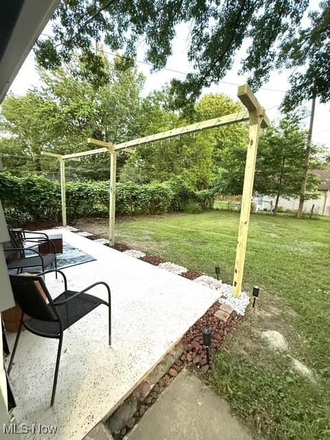 21430 Lakeshore Blvd, Euclid, OH 44123 - fenced backyard featuring a patio