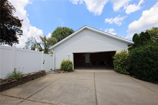1524 Walker Rd, Follansbee, WV 26037 - view of side of home featuring a detached garage and a gate