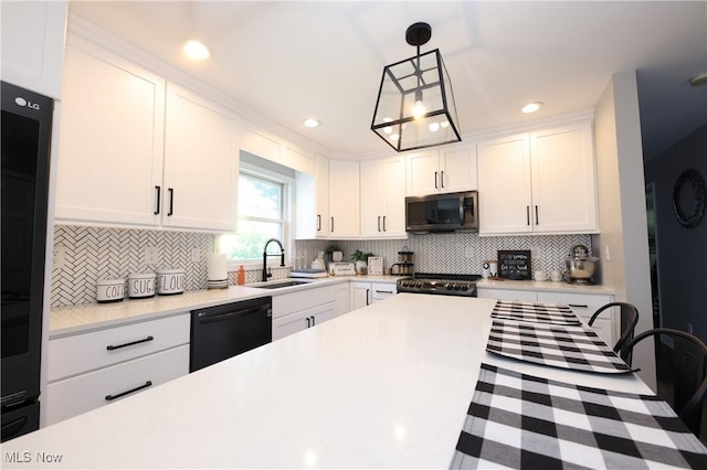 1524 Walker Rd, Follansbee, WV 26037 - kitchen with dishwasher, light countertops, white cabinets, backsplash, and recessed lighting