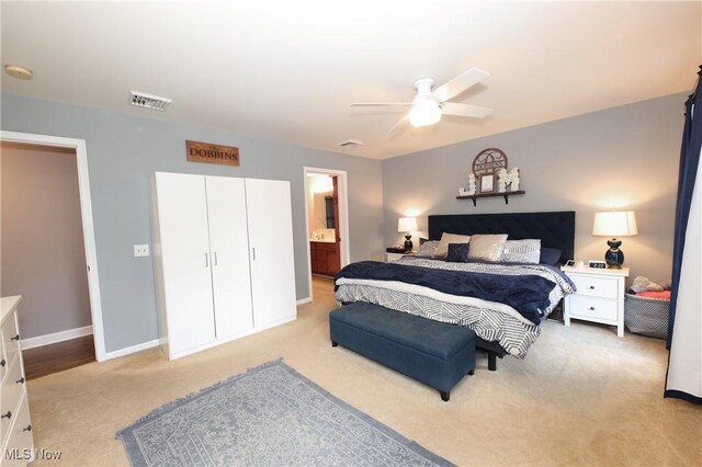 1524 Walker Rd, Follansbee, WV 26037 - bedroom with light carpet, ceiling fan, and connected bathroom