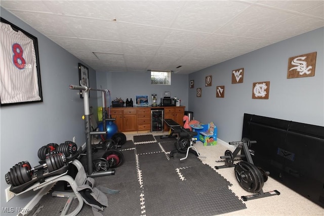 1524 Walker Rd, Follansbee, WV 26037 - exercise area with wine cooler, carpet floors, and a drop ceiling