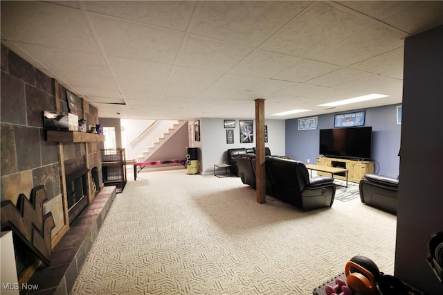 1524 Walker Rd, Follansbee, WV 26037 - living room featuring carpet flooring, a fireplace, and stairway