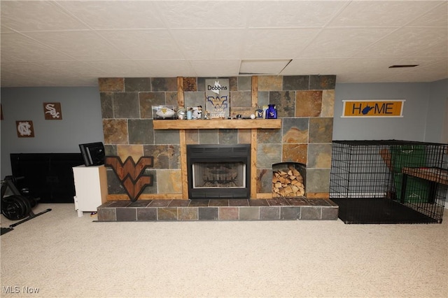 1524 Walker Rd, Follansbee, WV 26037 - carpeted living area with a paneled ceiling and a tile fireplace