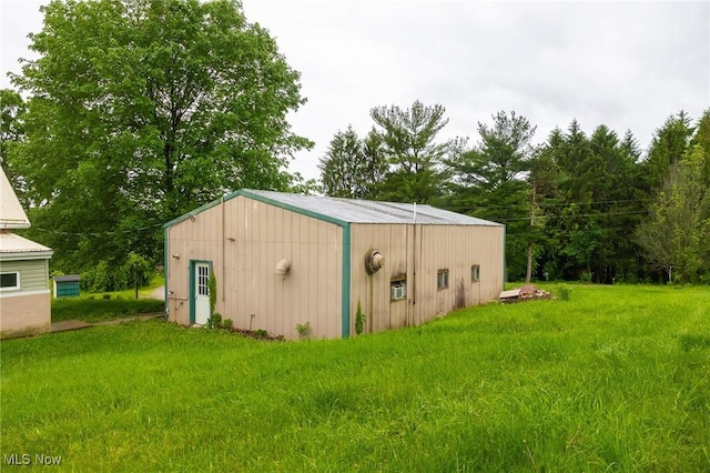 2461 Peters Creek Rd, Cambridge, OH 43725 - view of pole building featuring a lawn