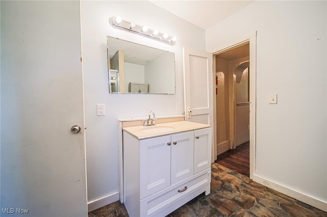 2461 Peters Creek Rd, Cambridge, OH 43725 - bathroom featuring stone finish flooring and vanity