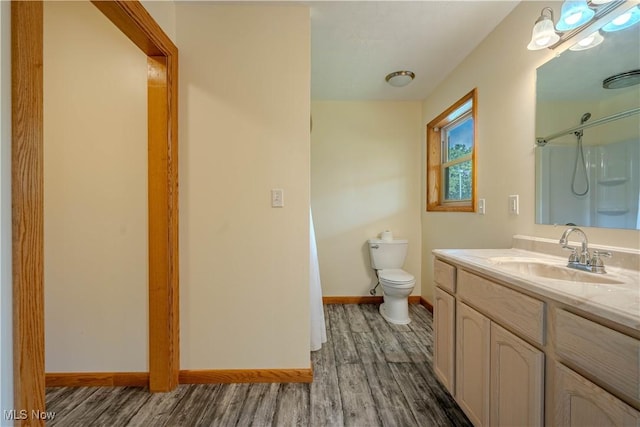 114 Buckner Bend Rd, Walker, WV 26180 - bathroom with wood finished floors, vanity, and a shower