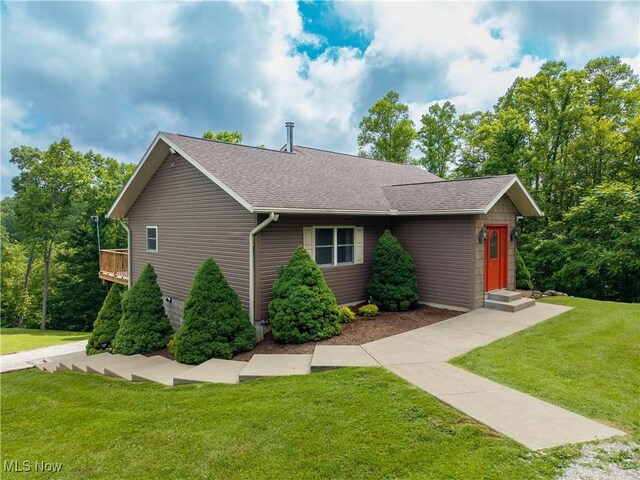 114 Buckner Bend Rd, Walker, WV 26180 - view of front of property featuring a front lawn and a shingled roof