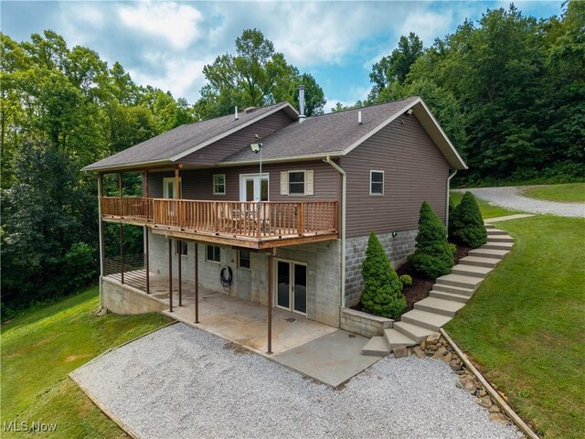 114 Buckner Bend Rd, Walker, WV 26180 - back of house featuring a patio, french doors, a lawn, and a wooden deck