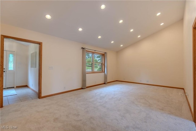 114 Buckner Bend Rd, Walker, WV 26180 - spare room featuring light colored carpet, recessed lighting, and lofted ceiling