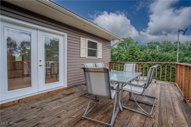 114 Buckner Bend Rd, Walker, WV 26180 - deck with outdoor dining area and french doors