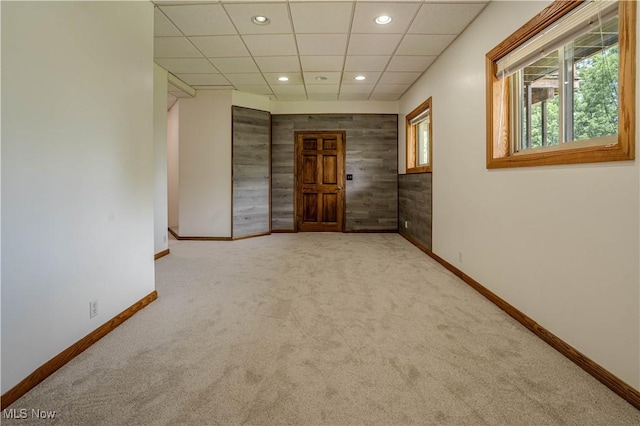 114 Buckner Bend Rd, Walker, WV 26180 - carpeted empty room featuring recessed lighting, wooden walls, and a paneled ceiling