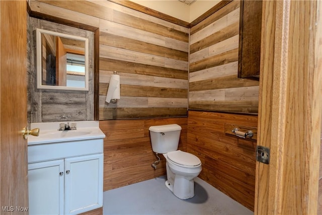 114 Buckner Bend Rd, Walker, WV 26180 - bathroom featuring vanity and wooden walls