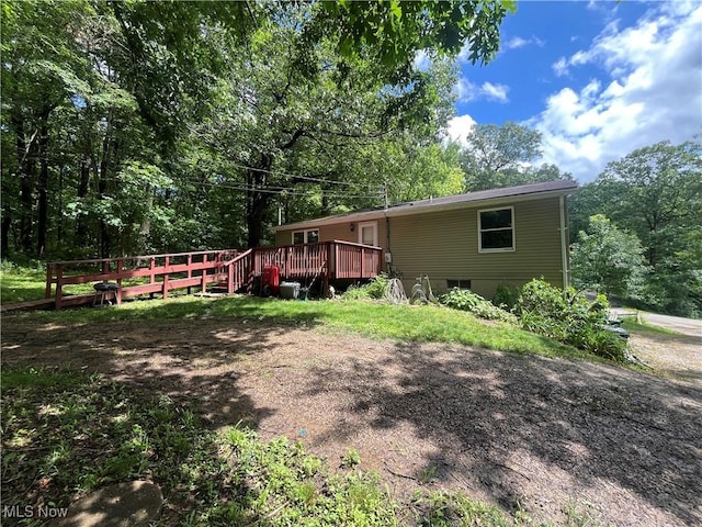 9420 Cedar Ct W, Nashport, OH 43830 - view of side of property with a deck