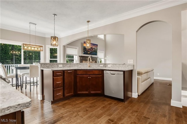12110 Cora Ct, Concord, OH 44077 - kitchen featuring dishwasher, crown molding, decorative light fixtures, dark wood finished floors, and arched walkways