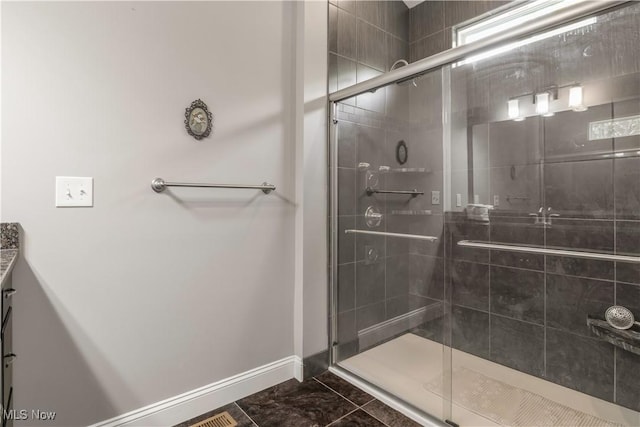 12110 Cora Ct, Concord, OH 44077 - bathroom with a shower stall, vanity, and marble finish flooring