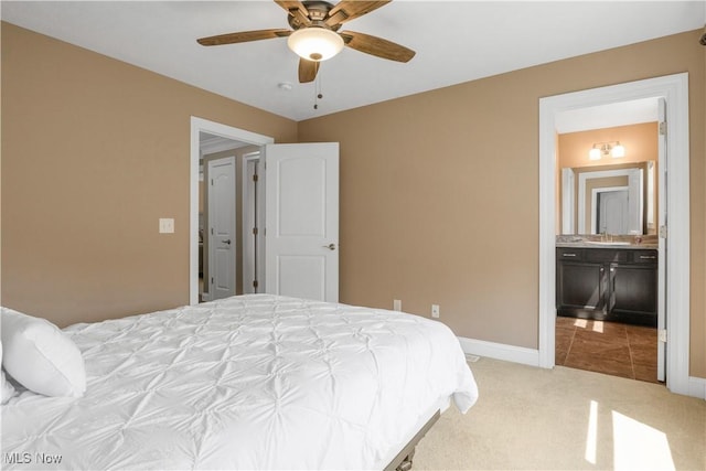 12110 Cora Ct, Concord, OH 44077 - bedroom with light carpet, ensuite bathroom, and a ceiling fan